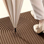 Absorbent, Washable Mat with Flowing Line Pattern